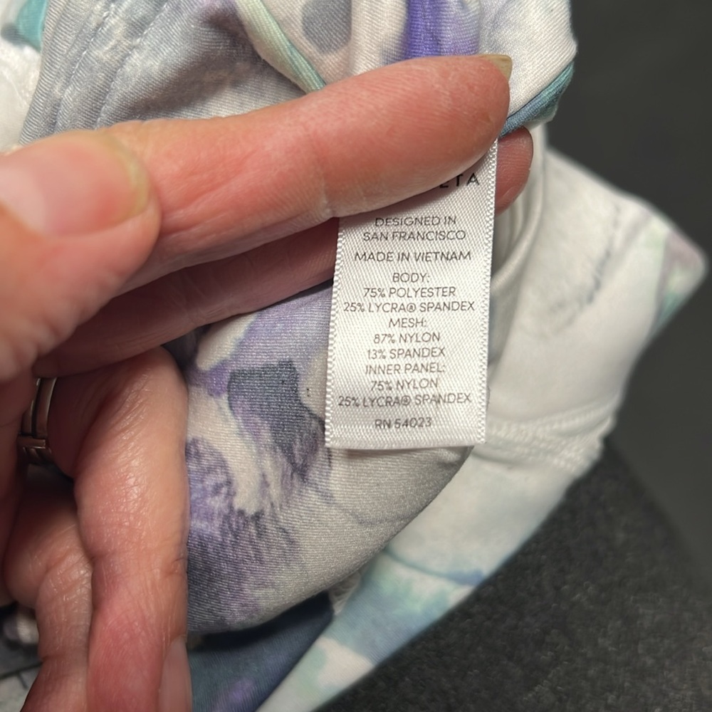Athleta Watercolor Floral 3/4 length Leggings in Purple and Green Shades. - Picture 7 of 7